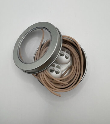 Knitting cord in metal tin with stoppers