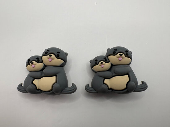 Knitting needle stoppers - Otters