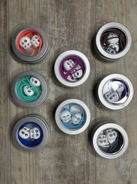 Knitting cord in metal tin with stoppers